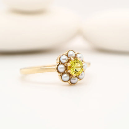 Yellow sapphire with pearl halo ring in 9k yellow gold