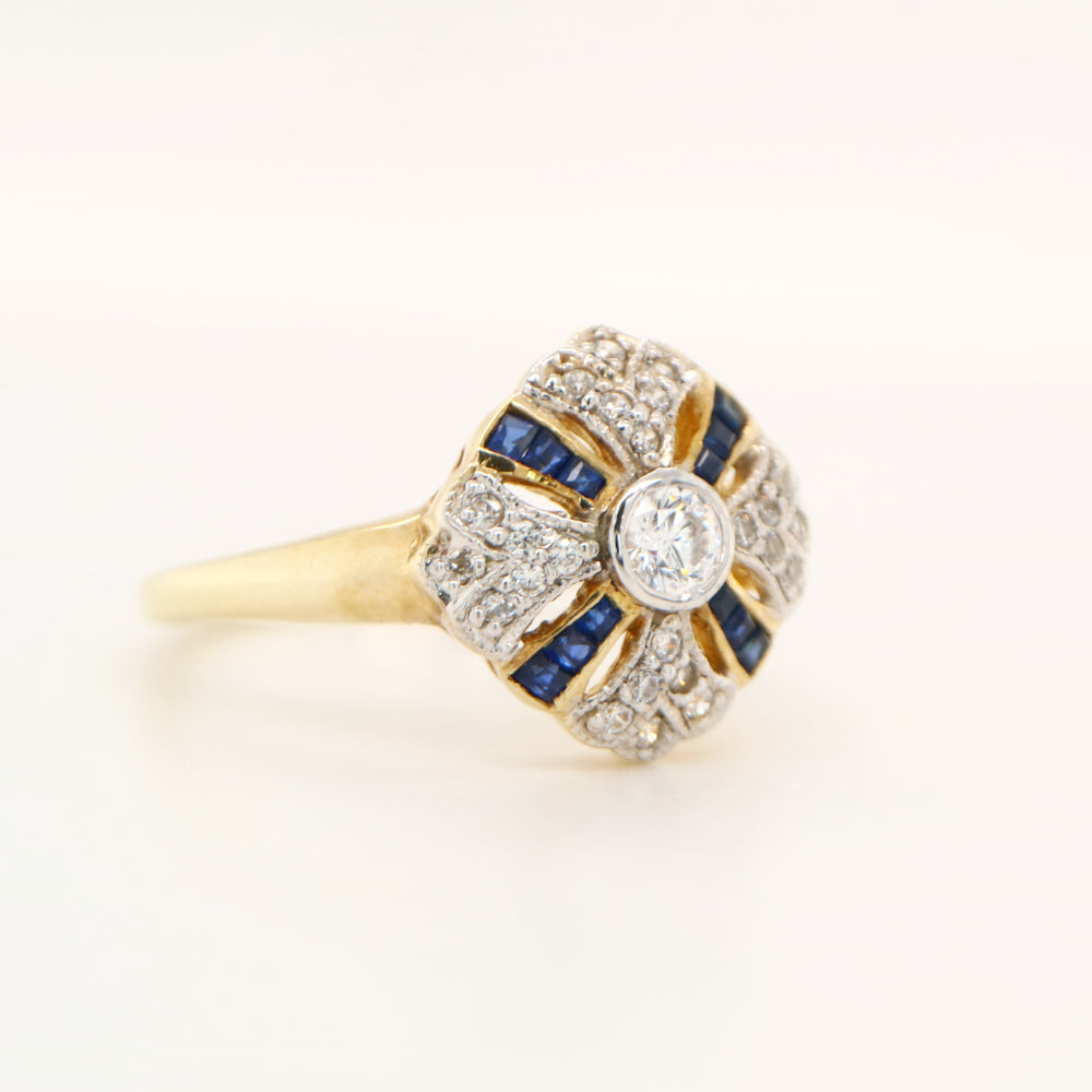 Art deco cross ring in yellow gold with sapphire and diamond