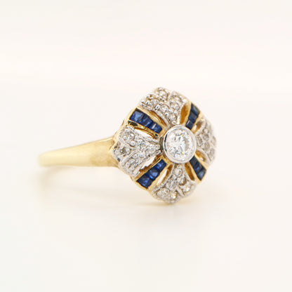 Art deco cross ring in yellow gold with sapphire and diamond