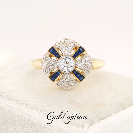 Art deco cross ring in yellow gold with sapphire and diamond