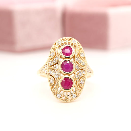 Ruby diamond three stone ring in 9ct yellow gold