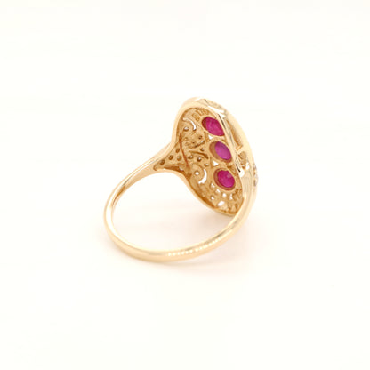 Ruby diamond three stone ring in 9ct yellow gold