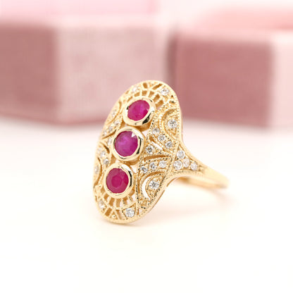 Ruby diamond three stone ring in 9ct yellow gold
