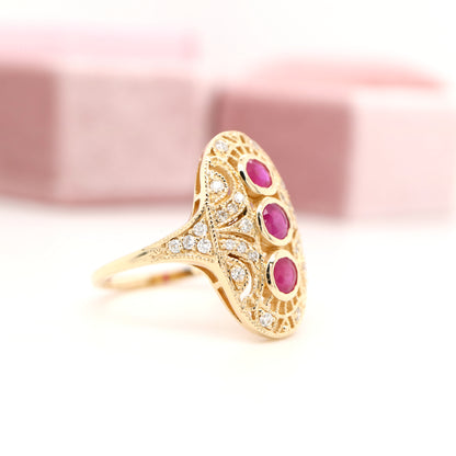 Ruby diamond three stone ring in 9ct yellow gold