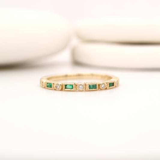Art deco half set band in solid yellow gold with emeralds and diamonds