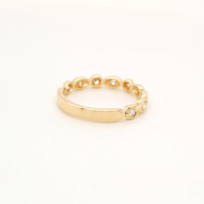 Art deco style half set band in yellow gold with natural diamonds