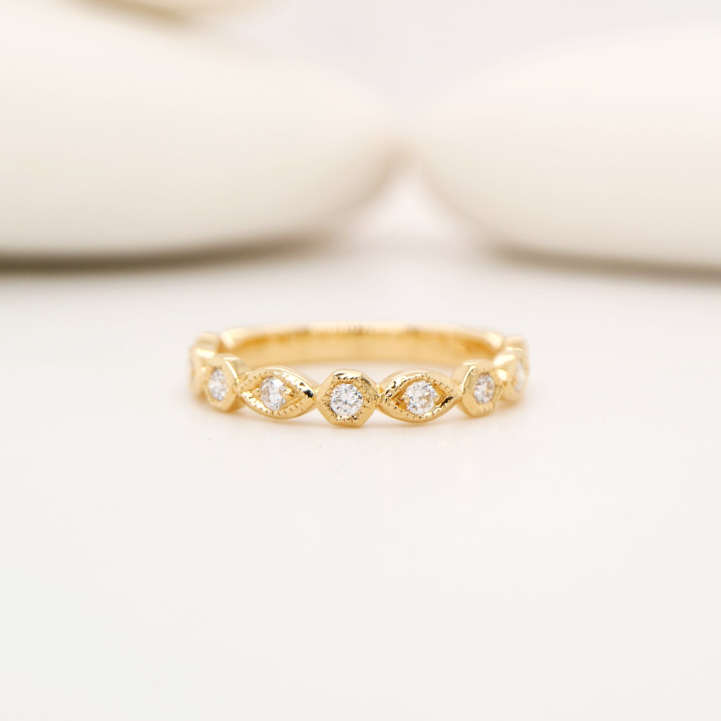 Art deco style half set band in yellow gold with natural diamonds