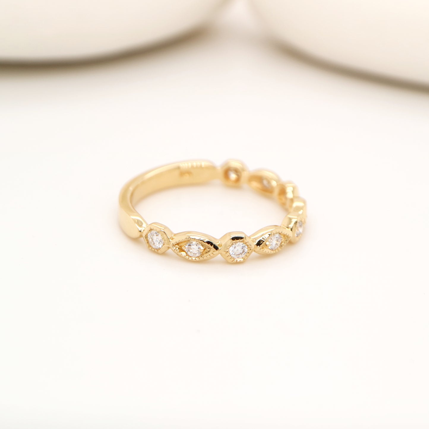Art deco style half set band in yellow gold with natural diamonds