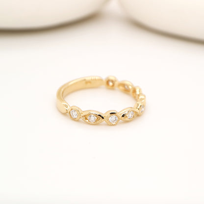 Art deco style half set band in yellow gold with natural diamonds