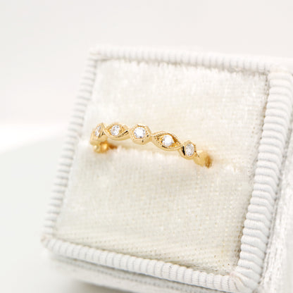Art deco style half set band in yellow gold with natural diamonds