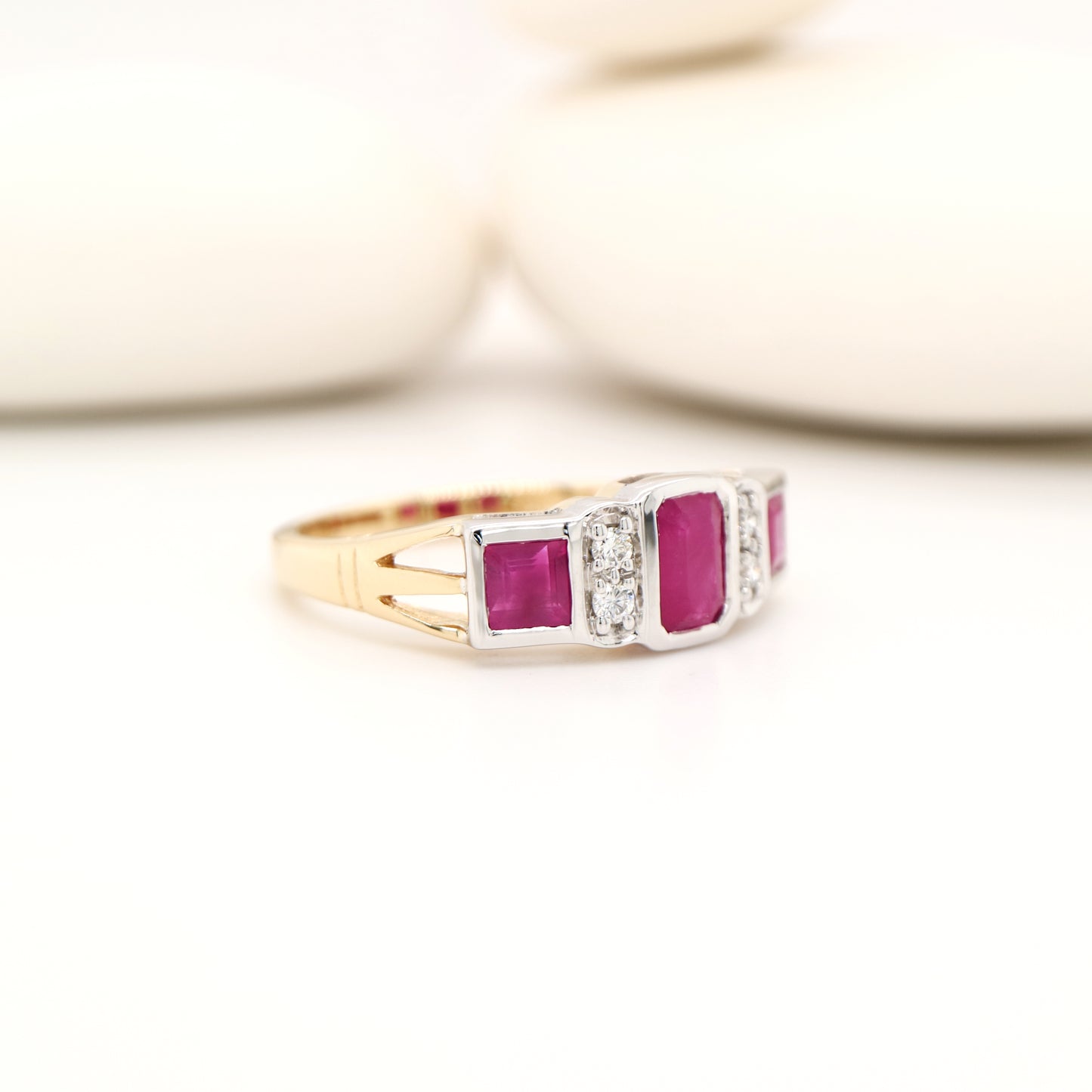 Art deco ring with ruby and diamond in twin gold