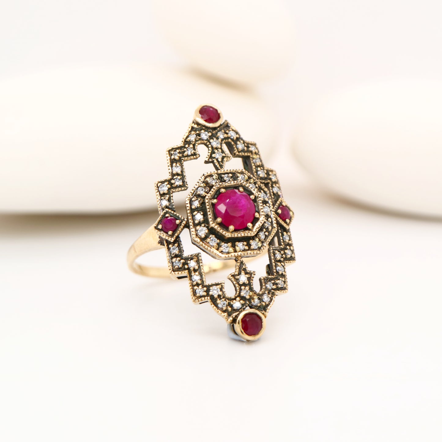 Oxidised gold cocktail ring with ruby and diamonds