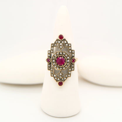 Oxidised gold cocktail ring with ruby and diamonds