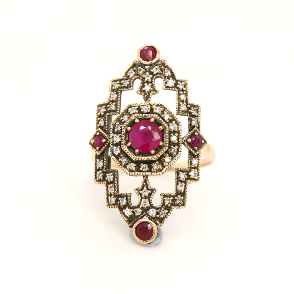 Oxidised gold cocktail ring with ruby and diamonds