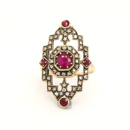 Oxidised gold cocktail ring with ruby and diamonds