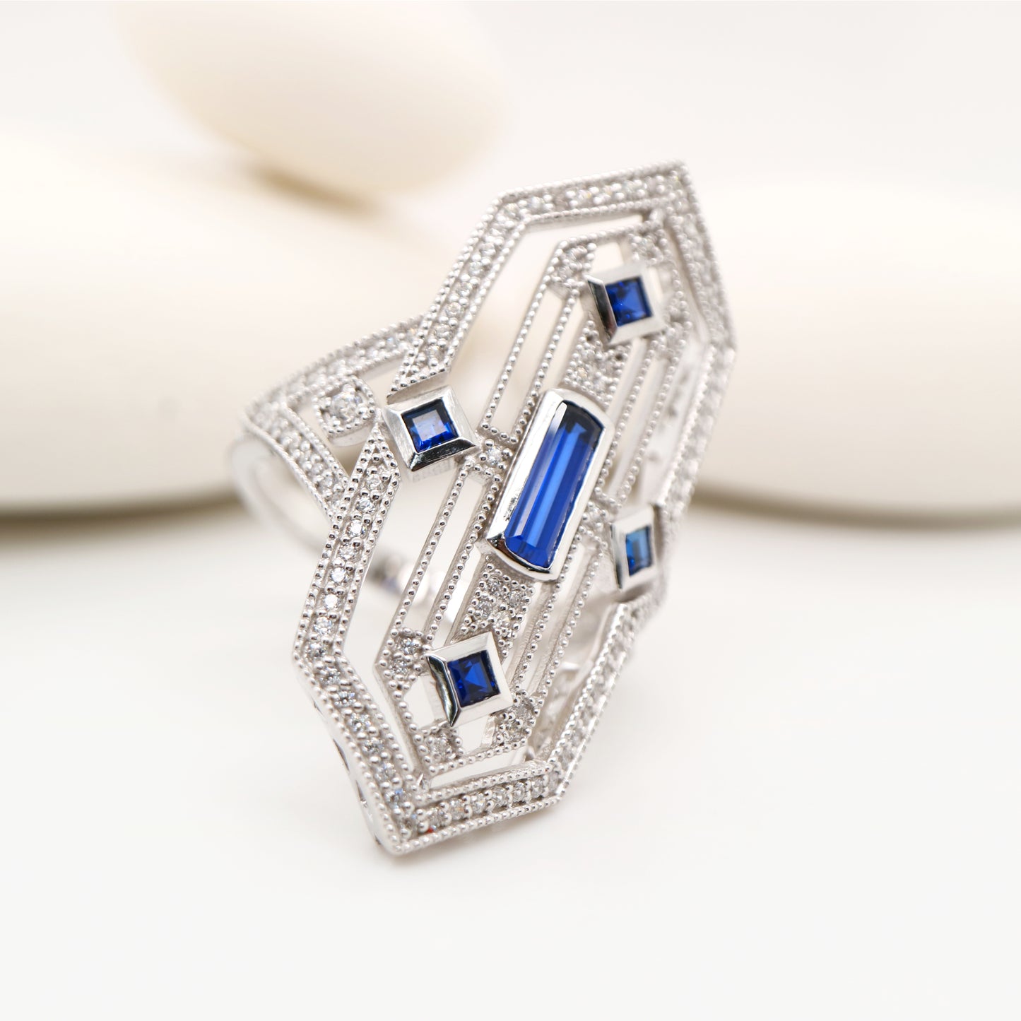 Art deco tower ring with sapphire and diamond in sterling silver