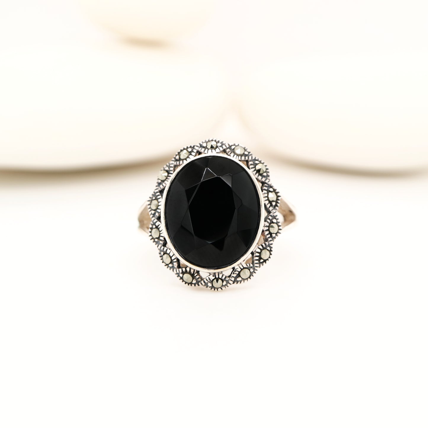 Art deco style black onyx ring with marcasite in scalloped edge in sterling silver