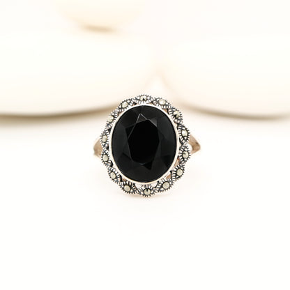 Art deco style black onyx ring with marcasite in scalloped edge in sterling silver