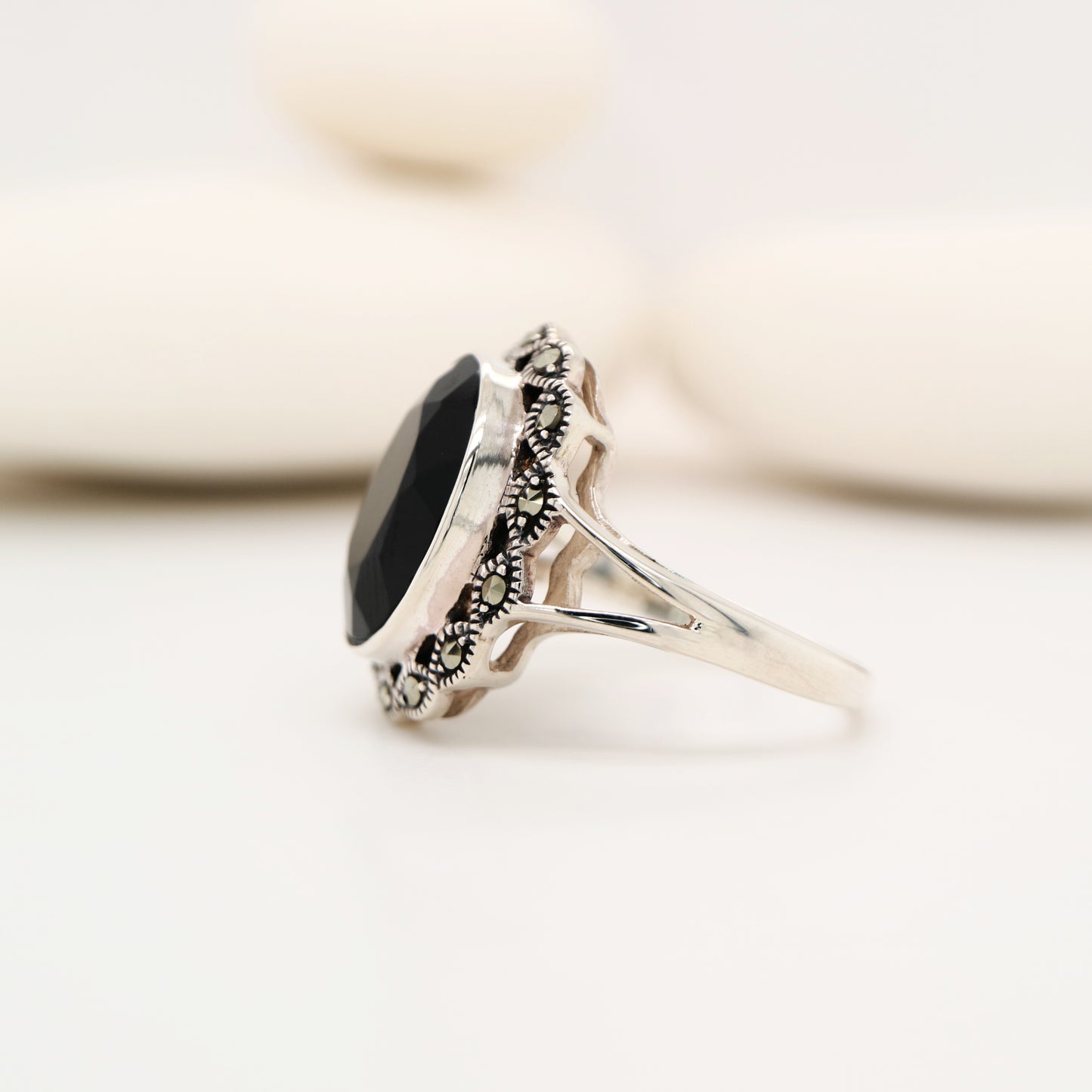 Art deco style black onyx ring with marcasite in scalloped edge in sterling silver
