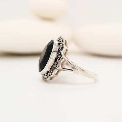 Art deco style black onyx ring with marcasite in scalloped edge in sterling silver