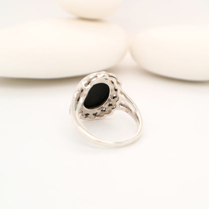 Art deco style black onyx ring with marcasite in scalloped edge in sterling silver