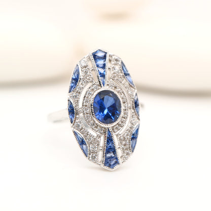Sterling silver shield ring with Verneuil sapphire and CZ