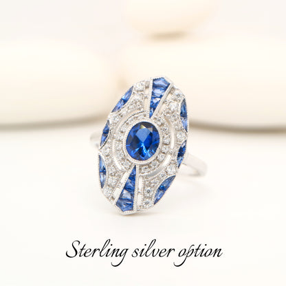 Sterling silver shield ring with Verneuil sapphire and CZ