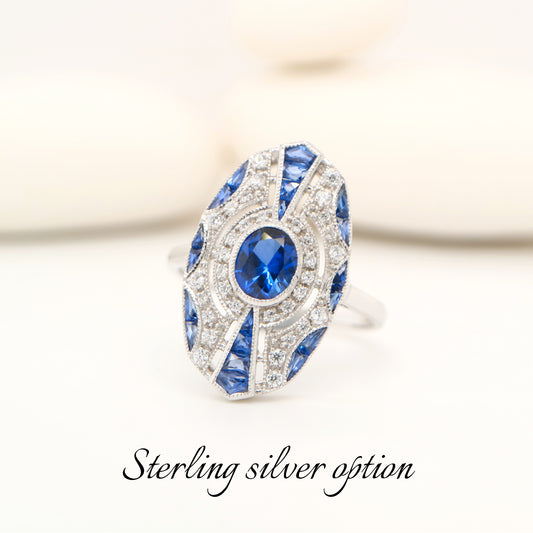 Sterling silver shield ring with Verneuil sapphire and CZ