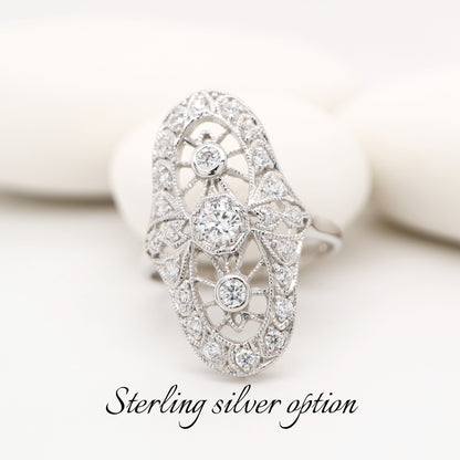 Cocktail halo ring with cubic zirconia in sterling silver