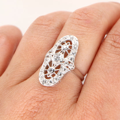 Cocktail halo ring with cubic zirconia in sterling silver