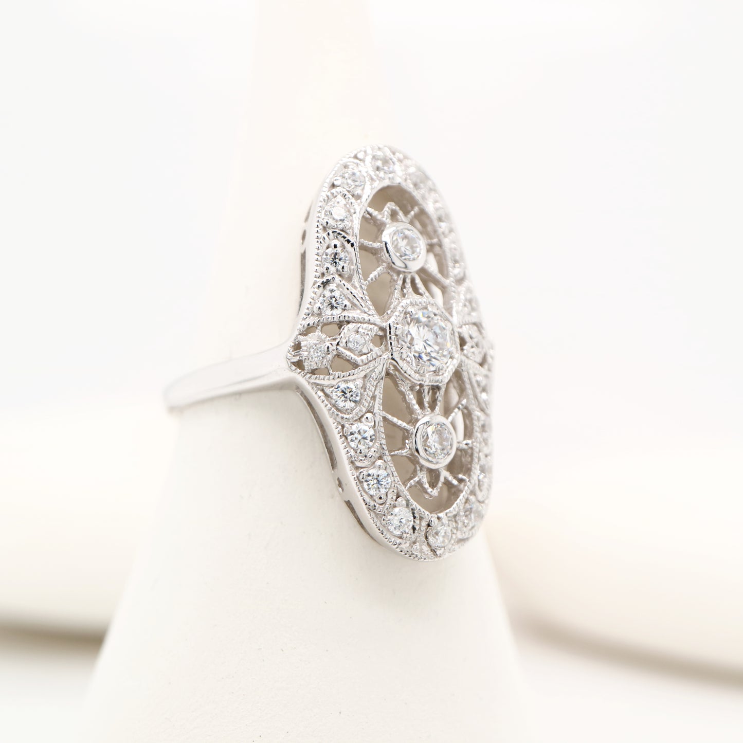 Cocktail halo ring with cubic zirconia in sterling silver
