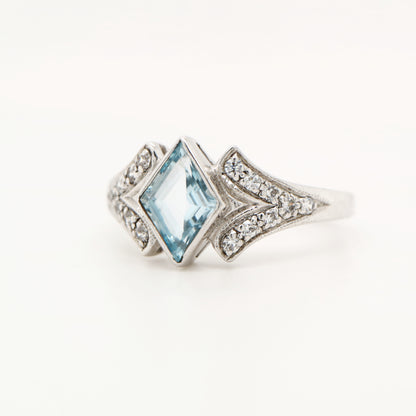 Diamond shape blue topaz with cz in sterling silver