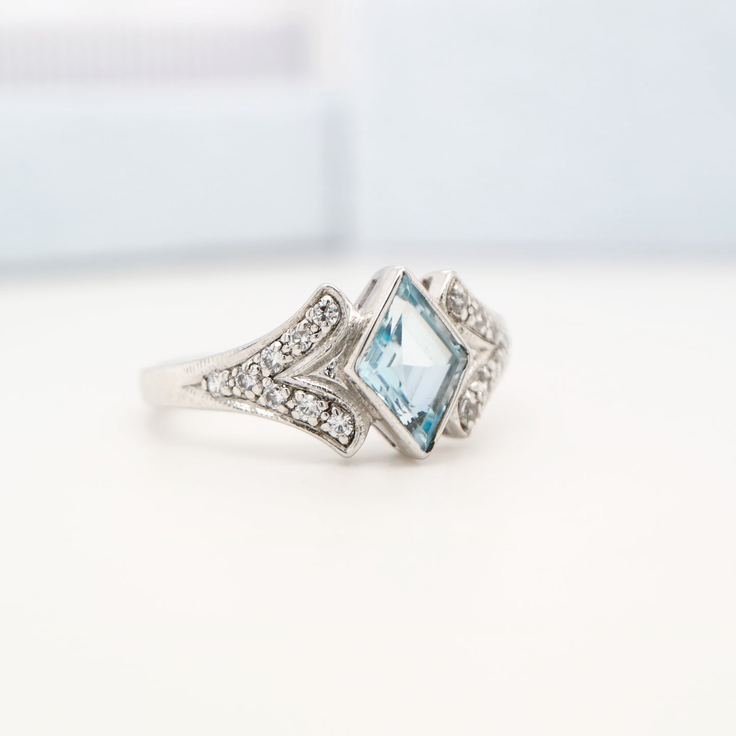 Diamond shape blue topaz with cz in sterling silver