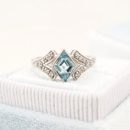 Diamond shape blue topaz with cz in sterling silver