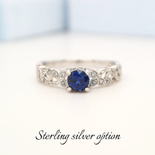 Sapphire solitaire sterling silver ring with cz in leaf pattern