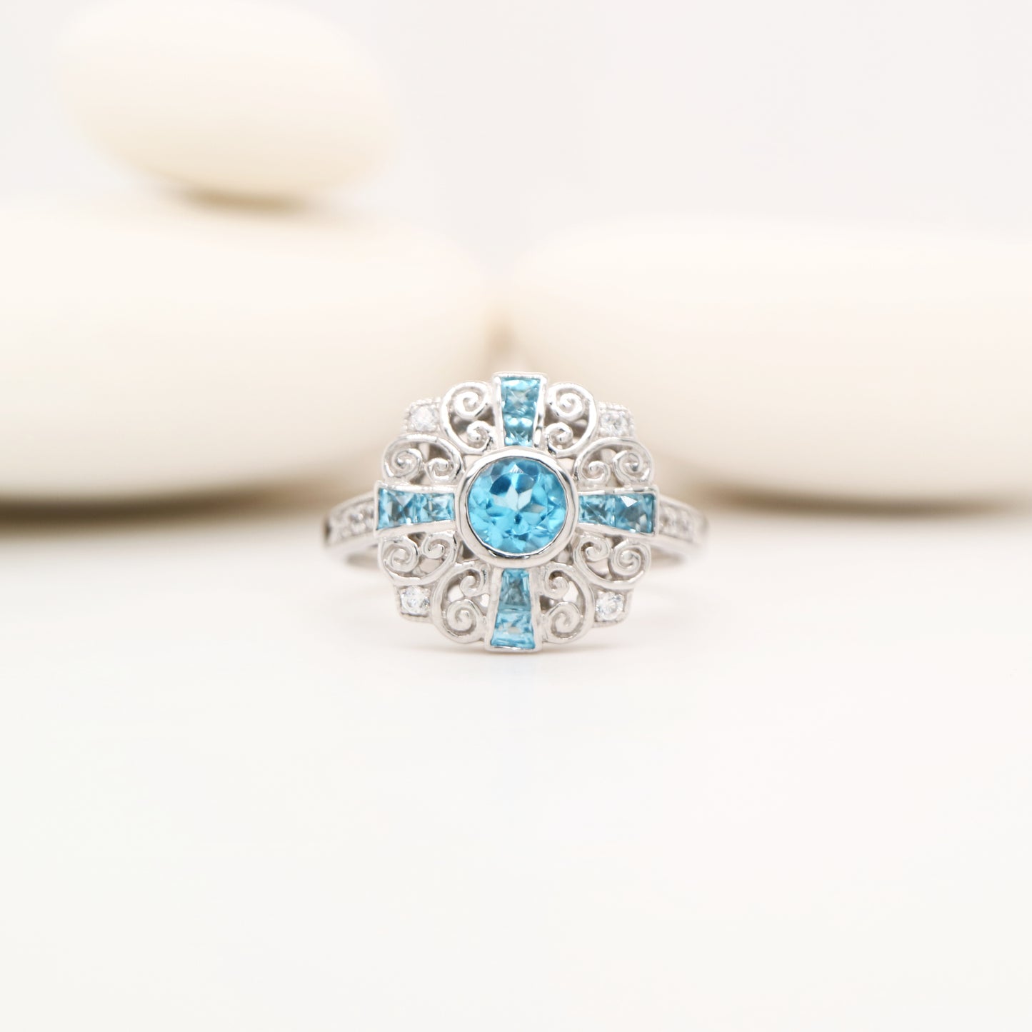 Filigree blue topaz and CZ ring in Sterling Silver