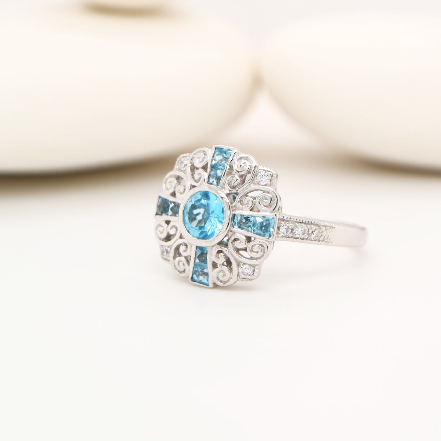 Filigree blue topaz and CZ ring in Sterling Silver
