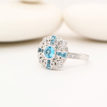 Filigree blue topaz and CZ ring in Sterling Silver