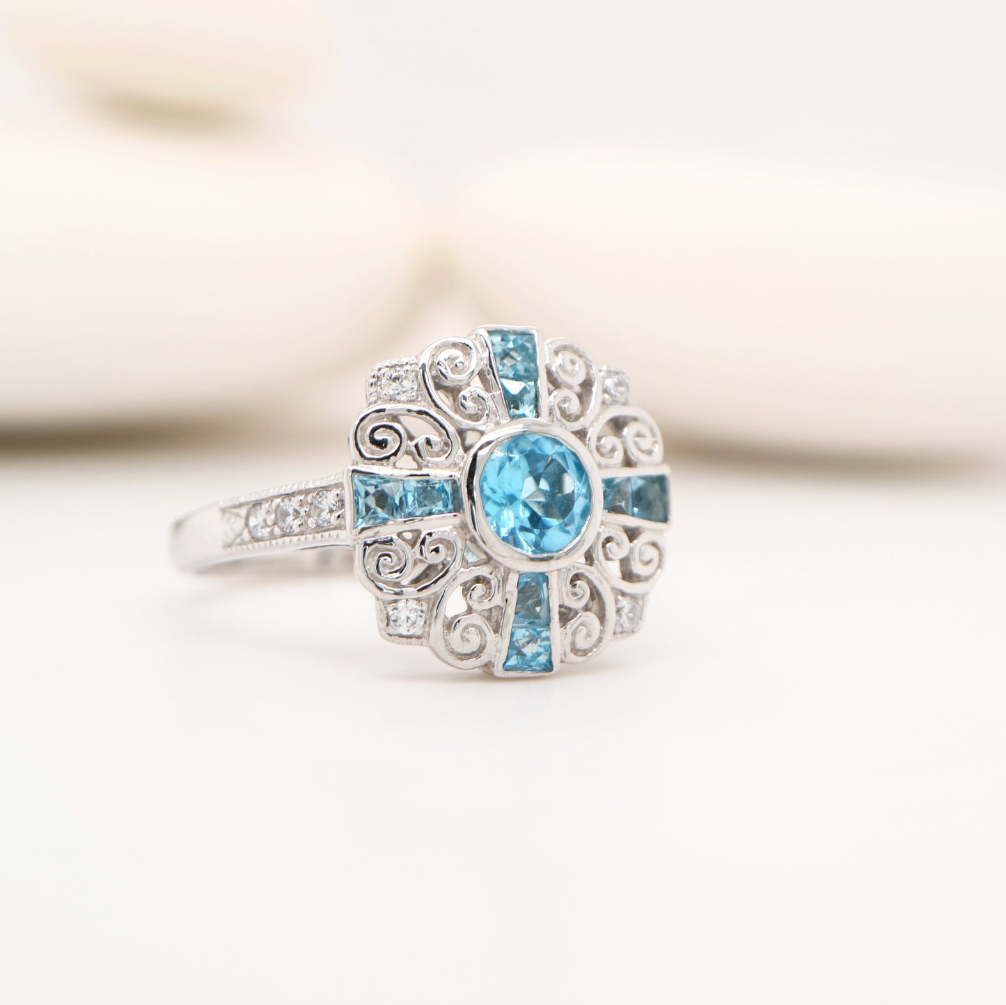 Filigree blue topaz and CZ ring in Sterling Silver