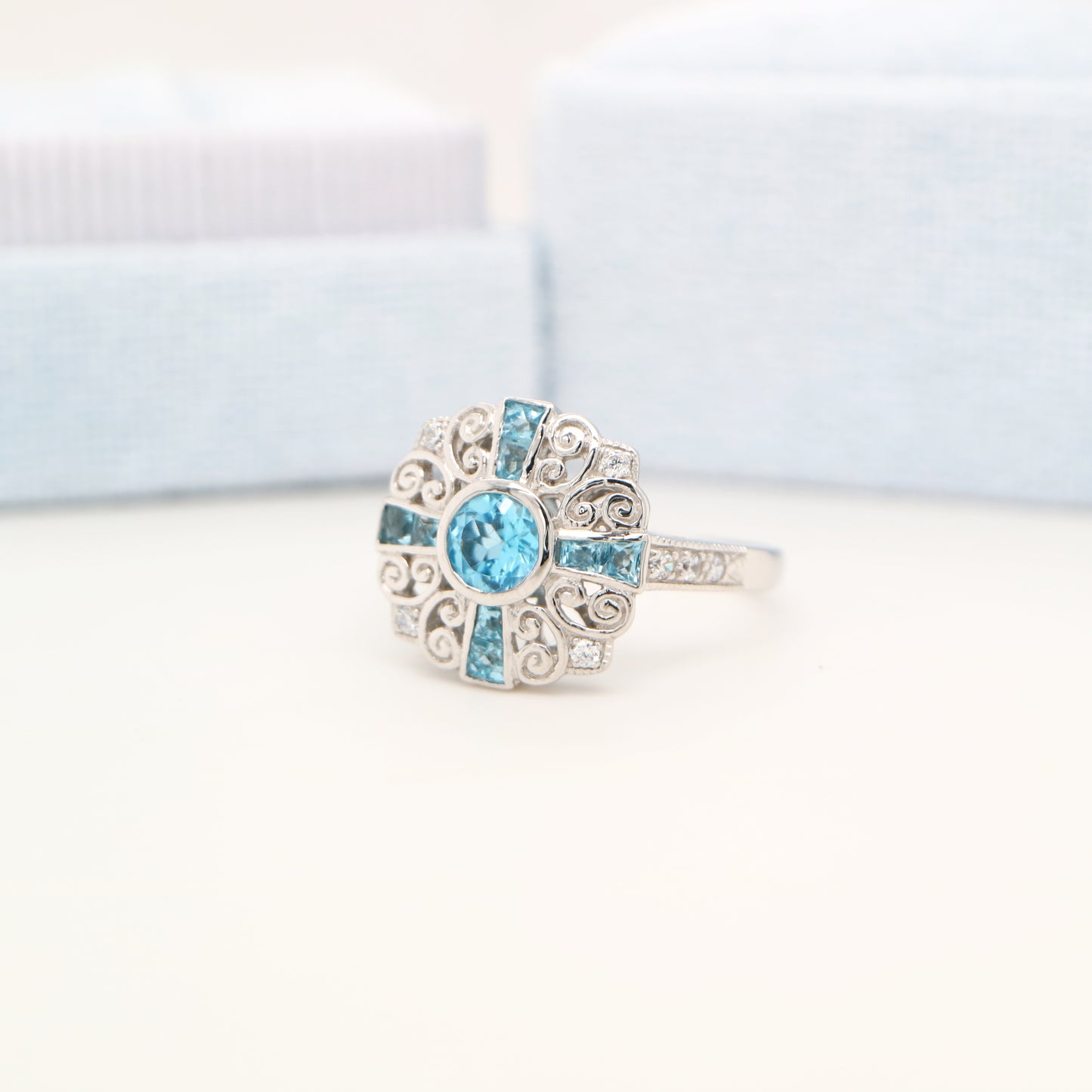 Filigree blue topaz and CZ ring in Sterling Silver