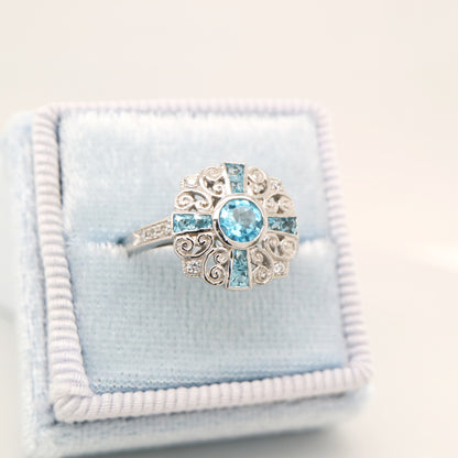 Filigree blue topaz and CZ ring in Sterling Silver