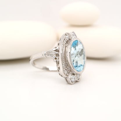 Blue topaz cocktail ring with cz in sterling silver