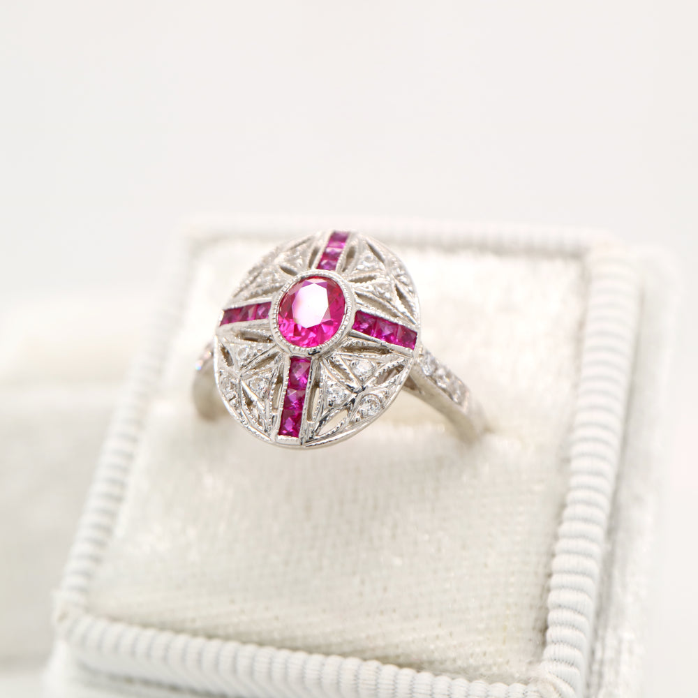 Art deco cross style ring in white gold and ruby with diamonds