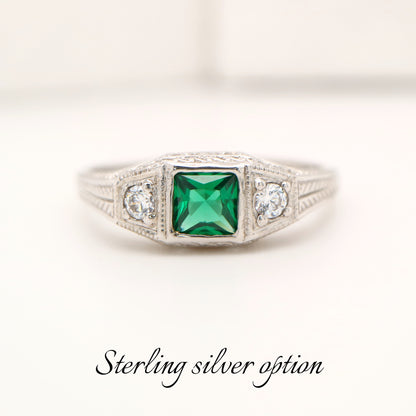 Art deco sterling silver ring with laboratory grown emerald and shoulder cz