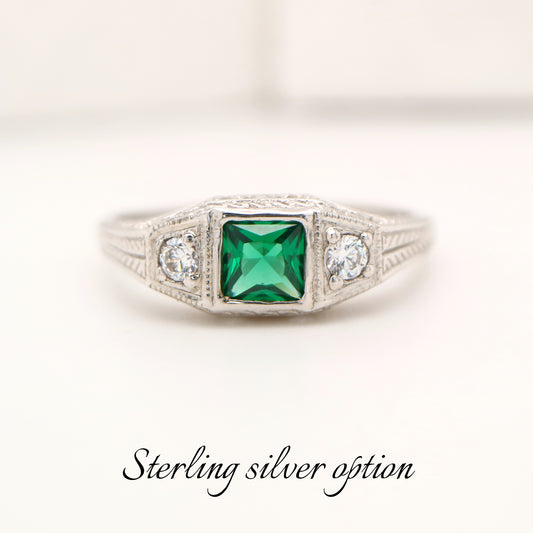 Art deco sterling silver ring with laboratory grown emerald and shoulder cz