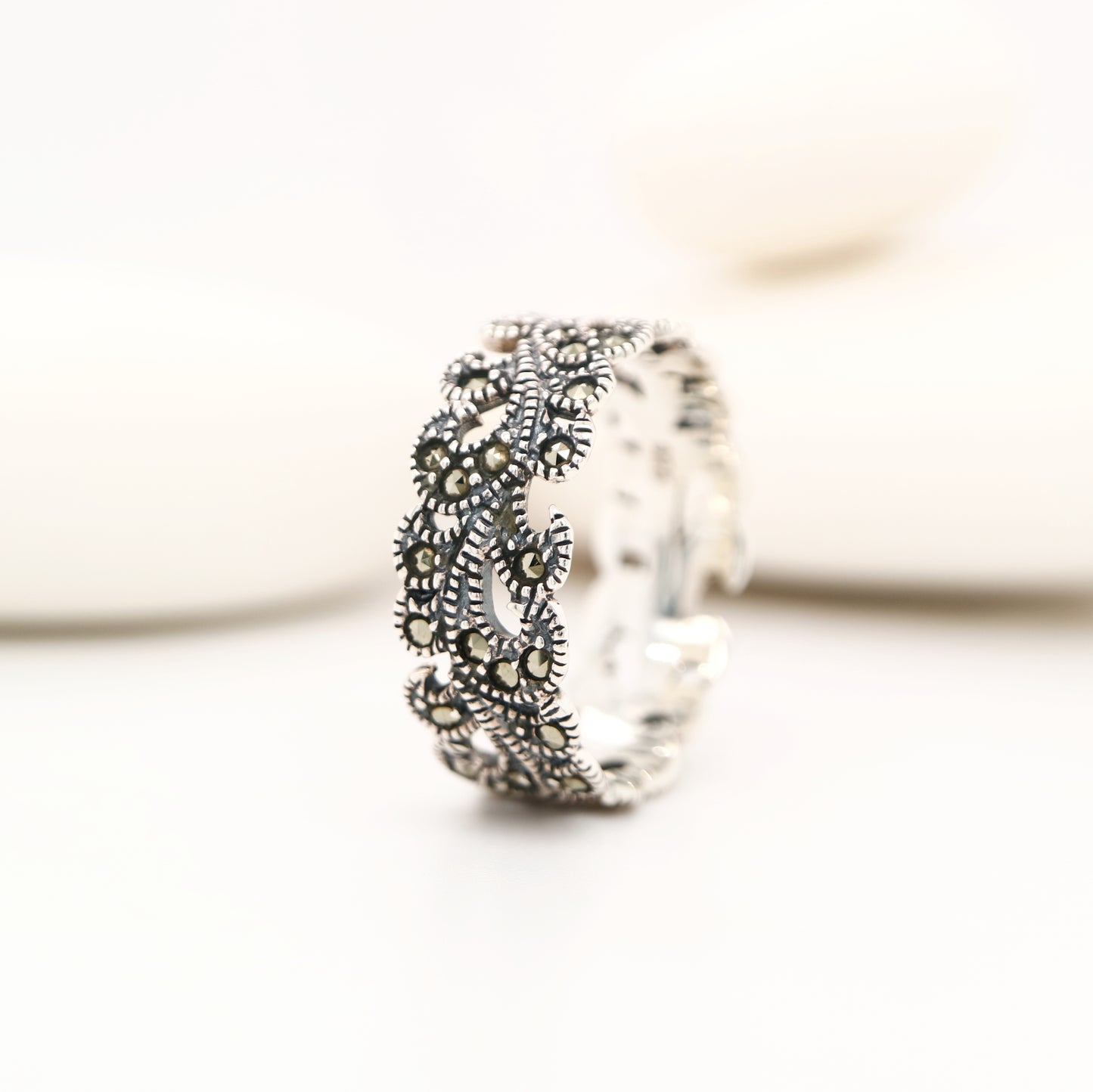 Filigree band marcasite ring in sterling silver