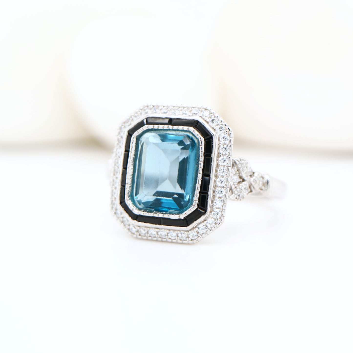 Onyx halo art deco ring with london blue topaz in sterling silver