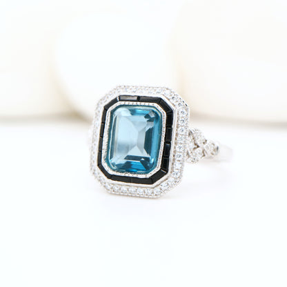 Onyx halo art deco ring with london blue topaz in sterling silver