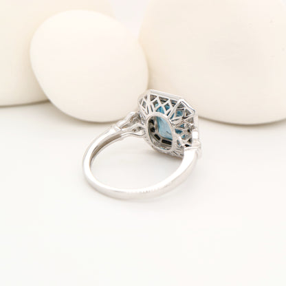 Onyx halo art deco ring with london blue topaz in sterling silver