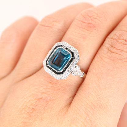 Onyx halo art deco ring with london blue topaz in sterling silver